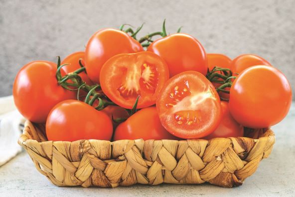 stock-photo-bunch-tomatoes-fresh-tomatoes-in-basket-on-stone-floor-organic-food-close-up-2186691697.jpg