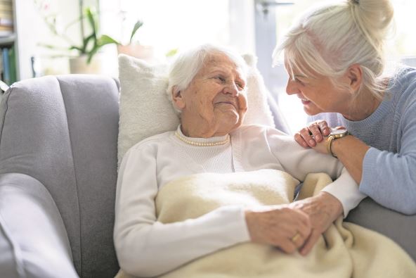 SAD JE RED NA VAS  stock-photo-elderly-woman-with-her-caregiver-at-nursing-home-2480651009.jpg