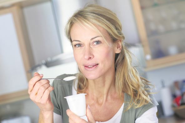 KRVNA GRUPA B  stock-photo-portrait-of-middle-aged-woman-eating-yoghurt-104158094.jpg