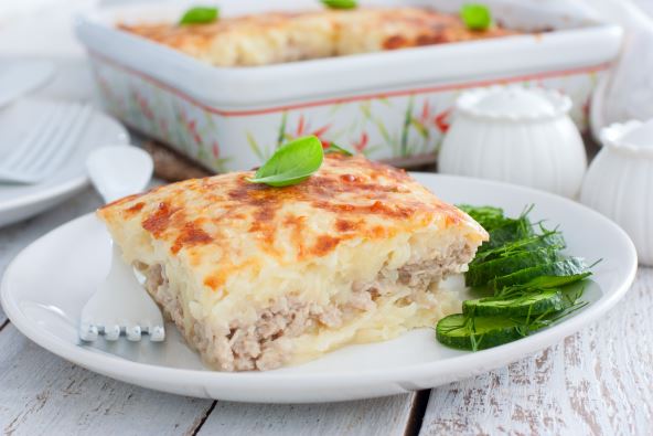 stock-photo-potato-casserole-with-minced-meat-on-a-plate-selective-focus-1727287864.jpg