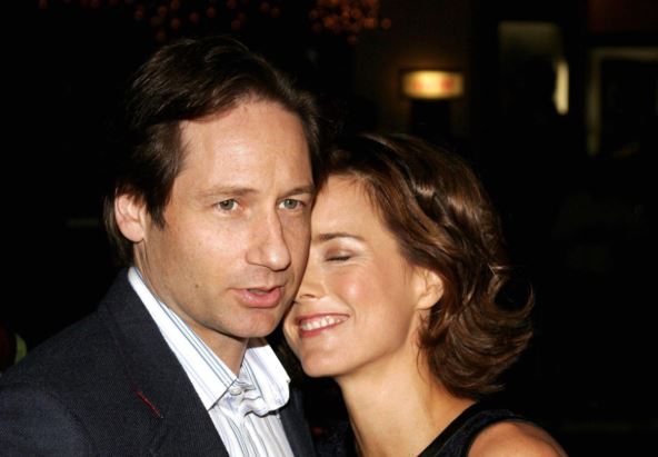 Dejvid Duhovni sa Teom Leoni se grli