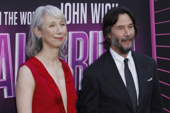 Kijanu Rivs sa suprugom