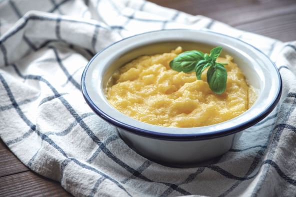 stock-photo-basic-polenta-in-a-bowl-on-wooden-background-traditional-italian-food-vegan-food-1439041016.jpg