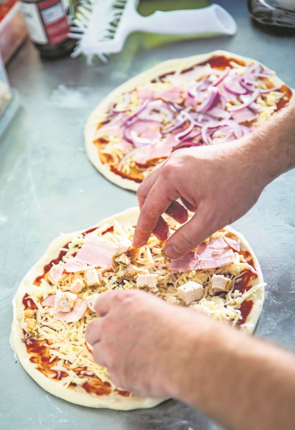 DODAJETE PREVISE NADEVA  stock-photo-closeup-hand-of-chef-baker-making-pizza-at-kitchen-the-process-of-making-pizza-cooking-italian-2067228191.jpg