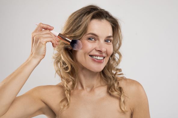 RUMENILO NA JAGODICAMA  stock-photo-daily-make-up-closeup-portrait-of-beautiful-middle-aged-woman-using-blusher-brush-attractive-2198746877.jpg