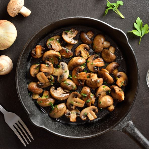 PECURKE  stock-photo-roasted-mushroom-in-cast-iron-pan-over-dark-stone-background-vegetarian-vegan-food-concept-top-2476651827.jpg