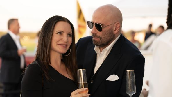 Kristin Dejvis i Džon Travolta u filmu Cash Out