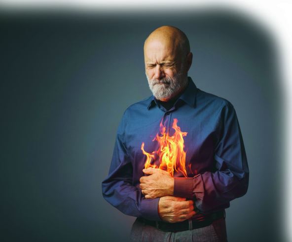 VATRA U ZELUCU  stock-photo-senior-man-with-flames-in-his-stomach-gastrointestinal-disease-reflux-inflammation-and-2585276591.jpg