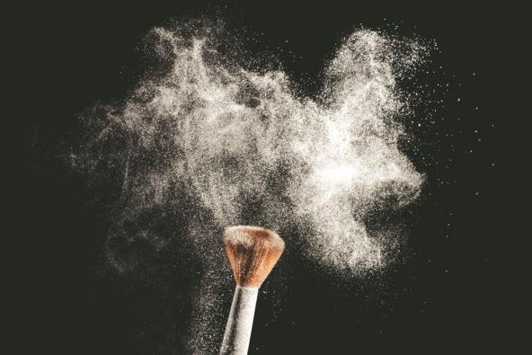 stock-photo-white-powder-splash-with-make-up-brush-blusher-isolated-on-black-background-2612456231.jpg