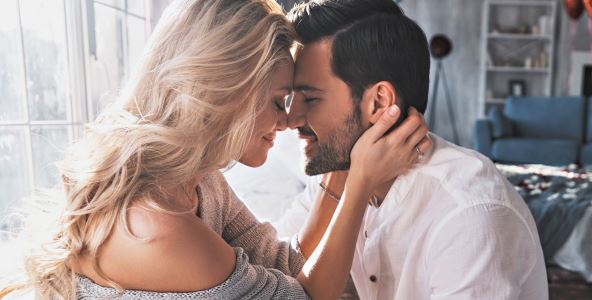 ANTR   stock-photo-young-loving-couple-embracing-and-touching-noses-while-sitting-face-to-face-indoor-2257856903.jpg