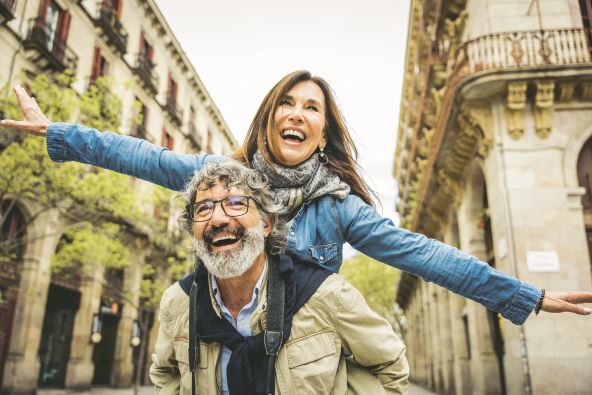 POBEGNITE OD SVAKODNEVICE  stock-photo-happy-senior-couple-having-fun-walking-on-city-street-two-older-tourists-enjoying-together-2483198413.jpg