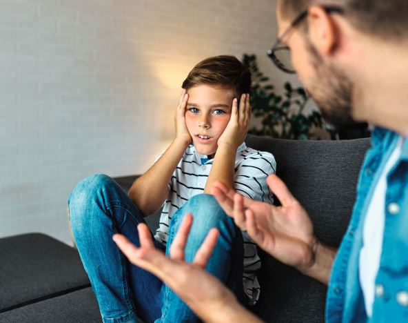 KAKO KAZNITI DETE  stock-photo-father-and-son-fighting-and-arguing-over-learning-at-home-boy-and-dad-sitting-at-home-conflict-and-2387066857.jpg