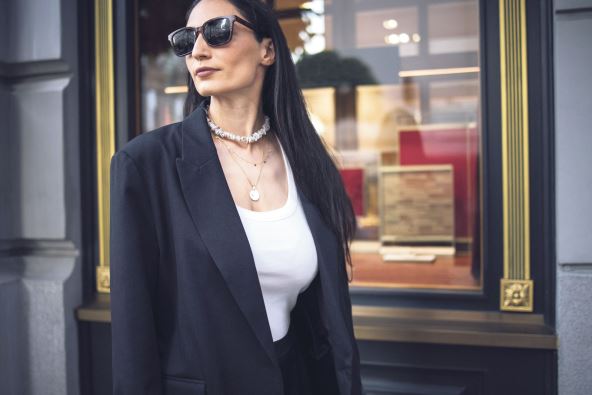 CRNI SAKO  stock-photo-confident-female-model-in-sunglasses-and-black-blazer-poses-outside-a-boutique-highlighting-2743529193.jpg