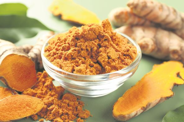 KURKUMA   stock-photo-aromatic-turmeric-powder-and-raw-roots-on-green-background-closeup-2349959219.jpg