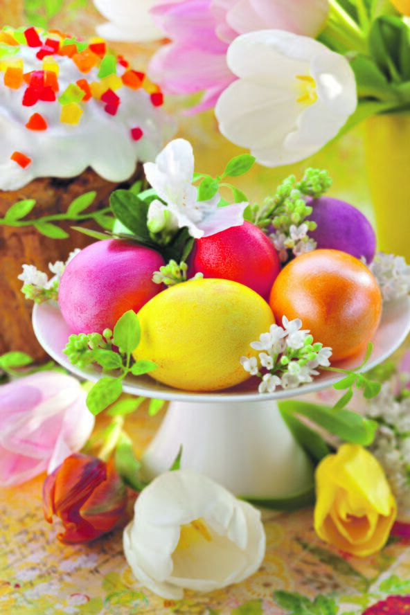 stock-photo-easter-eggs-and-cake-on-festive-table-94049497.jpg