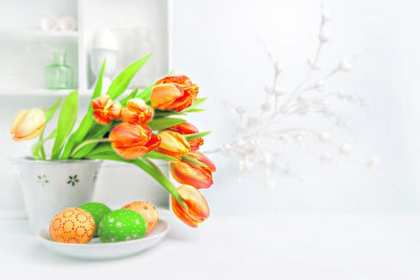 stock-photo-easter-greeting-card-design-with-bunch-of-tulips-and-painted-eggs-on-abstract-white-background-391674109.jpg