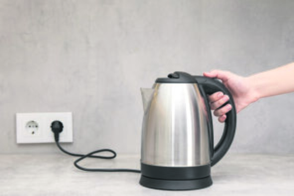 ELEKTRICNA  KUVALA ZA VODU   stock-photo-woman-with-electric-kettle-in-kitchen-closeup-space-for-text-2433793419.jpg