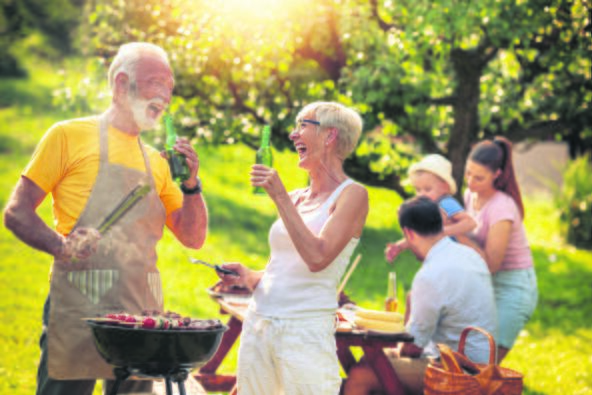 stock-photo-happy-family-having-barbecue-party-at-summer-garden-leisure-family-holidays-and-people-concept-1132151393.jpg
