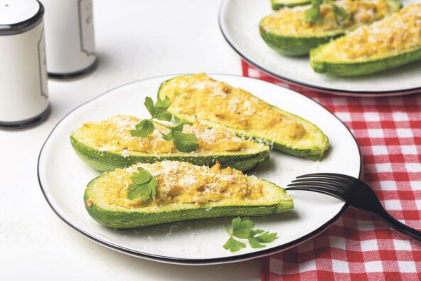 stock-photo-baked-zucchini-boats-stuffed-with-ricotta-cheese-and-tuna-fish-parmesan-cheese-close-up-2206475587.jpg