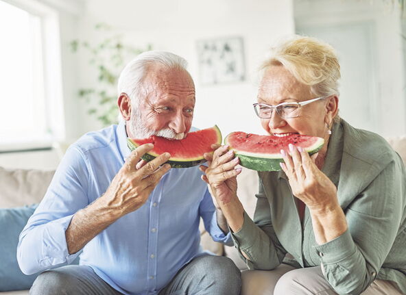 ANTR  stock-photo-portrait-of-a-happy-senior-couple-embracing-eating-watermelon-and-having-fun-at-home-2362481341.jpg