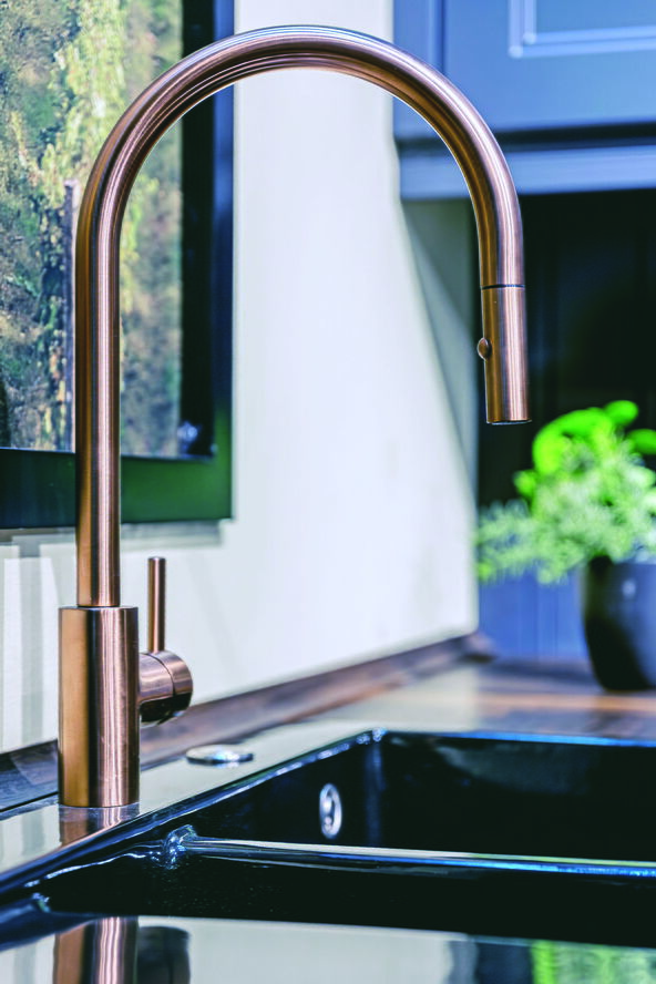 2      stock-photo-tall-copper-tap-in-a-modern-kitchen-elegant-plumbing-fixtures-in-minimalist-interior-2775344887.jpg