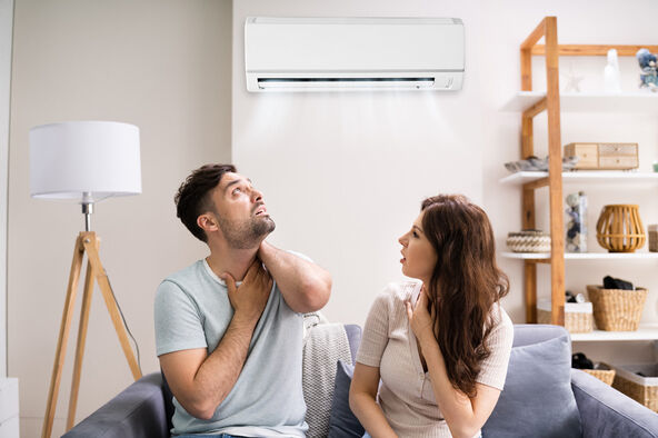 stock-photo-sick-couple-having-cold-and-sore-throat-from-air-conditioner-1796349073.jpg