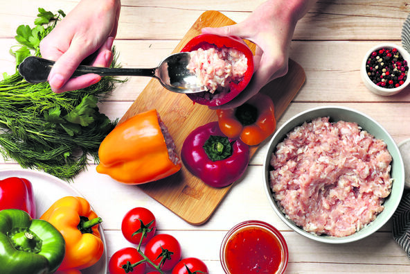 PAPRIKE PUNITE DO VRHA  stock-photo-woman-making-stuffed-peppers-with-ground-meat-at-white-wooden-table-top-view-2469284871.jpg