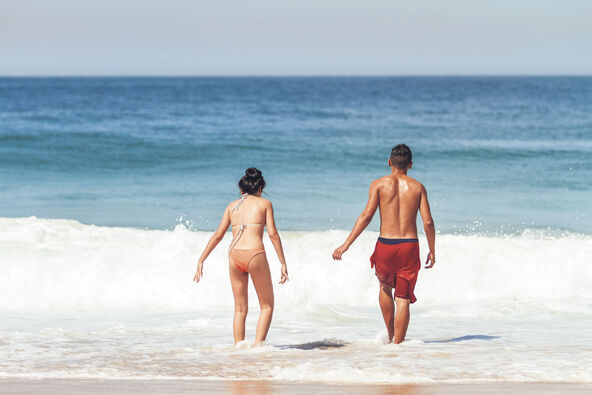 ANTRFILE  stock-photo-young-couple-have-fun-as-they-enter-the-sea-at-copacabana-beach-in-rio-de-janeiro-brazil-1240077958.jpg