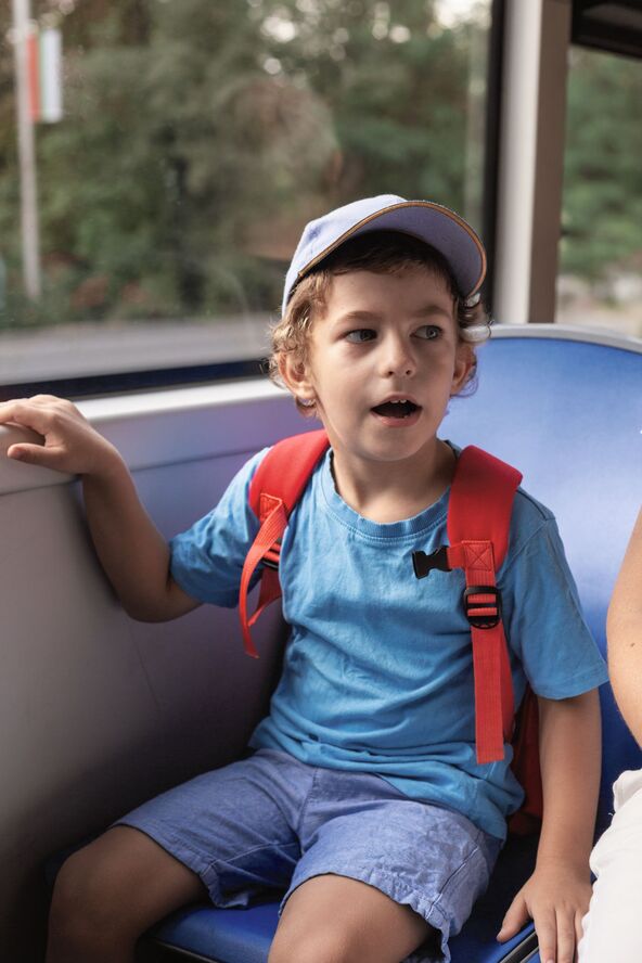 stock-photo--a-young-boy-riding-a-bus-little-boy-sitting-on-a-chair-2677777337.jpg
