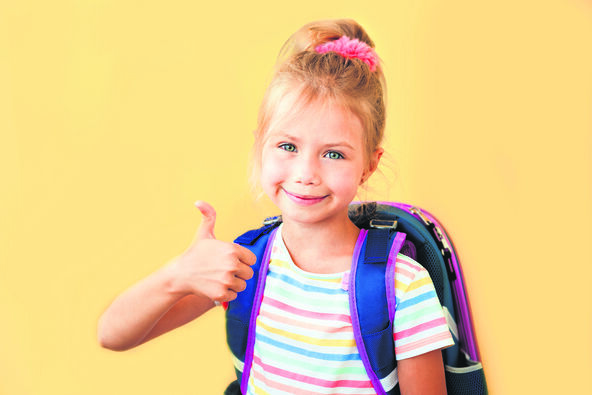 UZ GLOSU   stock-photo-portrait-of-a-smiling-little-schoolgirl-with-backpack-on-yellow-background-1426994000.jpg