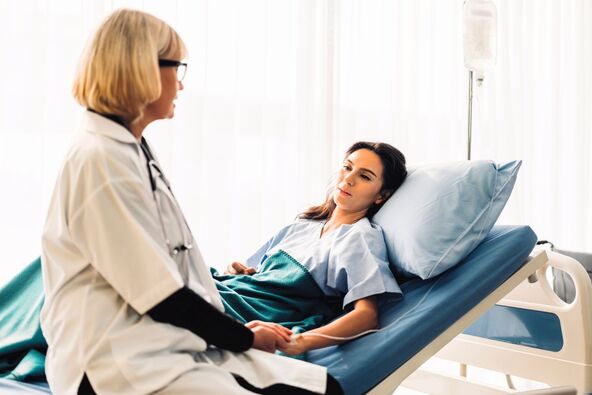 KAKO SE LECI   stock-photo-woman-doctor-consulting-and-holding-hand-patient-reassuring-with-care-on-doctors-table-in-hospital-2064097097.jpg