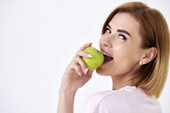 GLAVNA  stock-photo-girl-holding-green-apple-isolated-on-white-background-2207730003.jpg