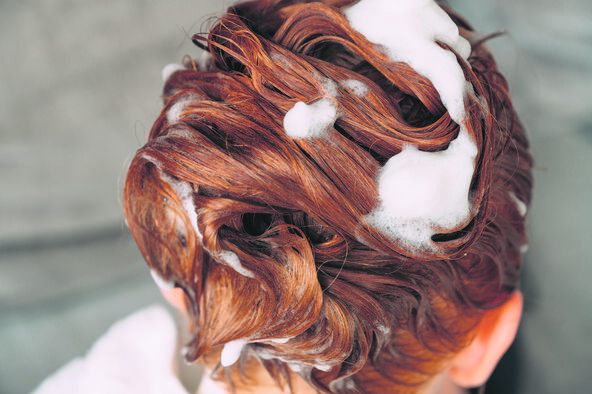 stock-photo-red-hair-with-foam-from-shampoo-close-up-selective-focus-2198602165.jpg