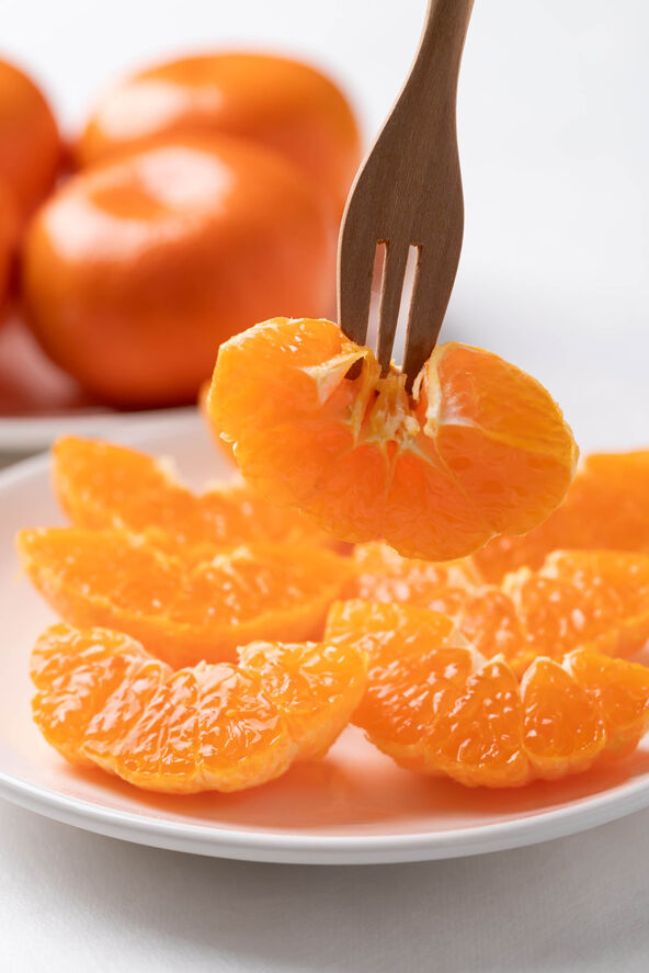 stock-photo-fresh-cut-of-mandarin-orange-fruit-on-plate-ready-to-eating-2709439437.jpg