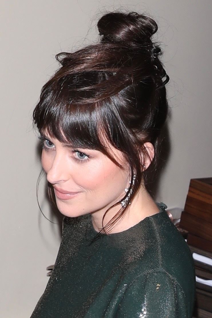 Dakota Džonson u zelenoj haljini