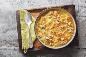 stockphotodietwintereggrollsoupwithmincedmeatvegetablesandspicescloseupinabowlonthetable2561285999.jpg