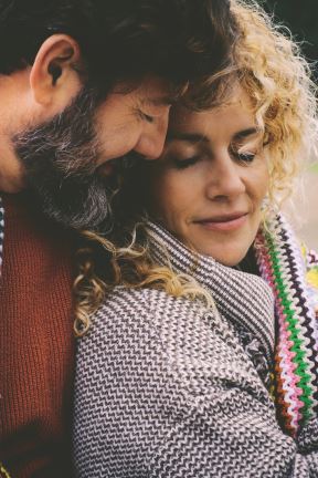 GLAVNA  stock-photo-romantic-adult-couple-stay-together-with-feeling-and-love-covered-by-a-woolen-colorful-blanket-at-2412861151.jpg