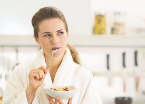 GLAVNA stock-photo-happy-young-woman-in-bathrobe-eating-healthy-breakfast-128012258.jpg