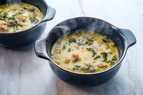 stockphotoitaliantraditionalsoupzuppatoscanawithsausageskalepotatoesandbaconcloseupinaplate2503989377.jpg